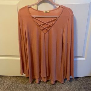Pink long sleeved blouse
